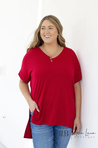 It's All Going On Women's Hi-Lo Rolled Short Sleeve Top