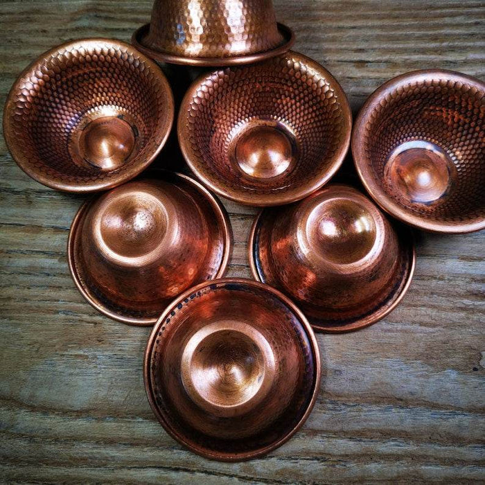 Buddhist Water Offering Bowls - Tibetan Buddhist art, close-up detail
