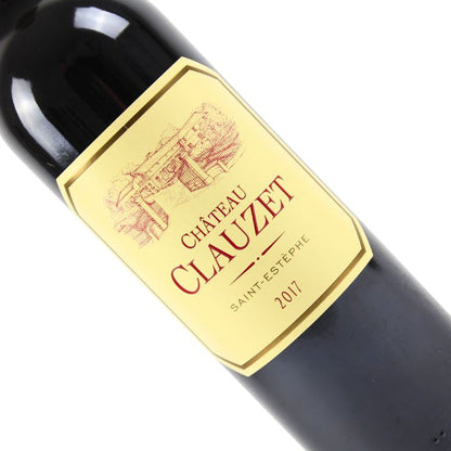 Wine bottle with Château Clauzet label on a white background