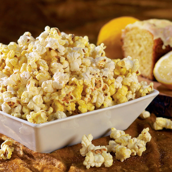 lemon pound cake popcorn shown in white dish