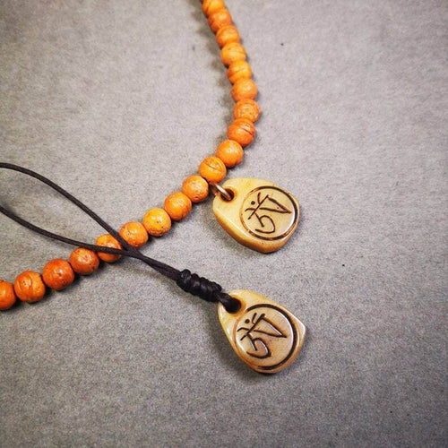 Yak Bone Carved Amulet,Om Pendant for Mala,Bag Hanging - Tibetan Buddhist mala beads, front view